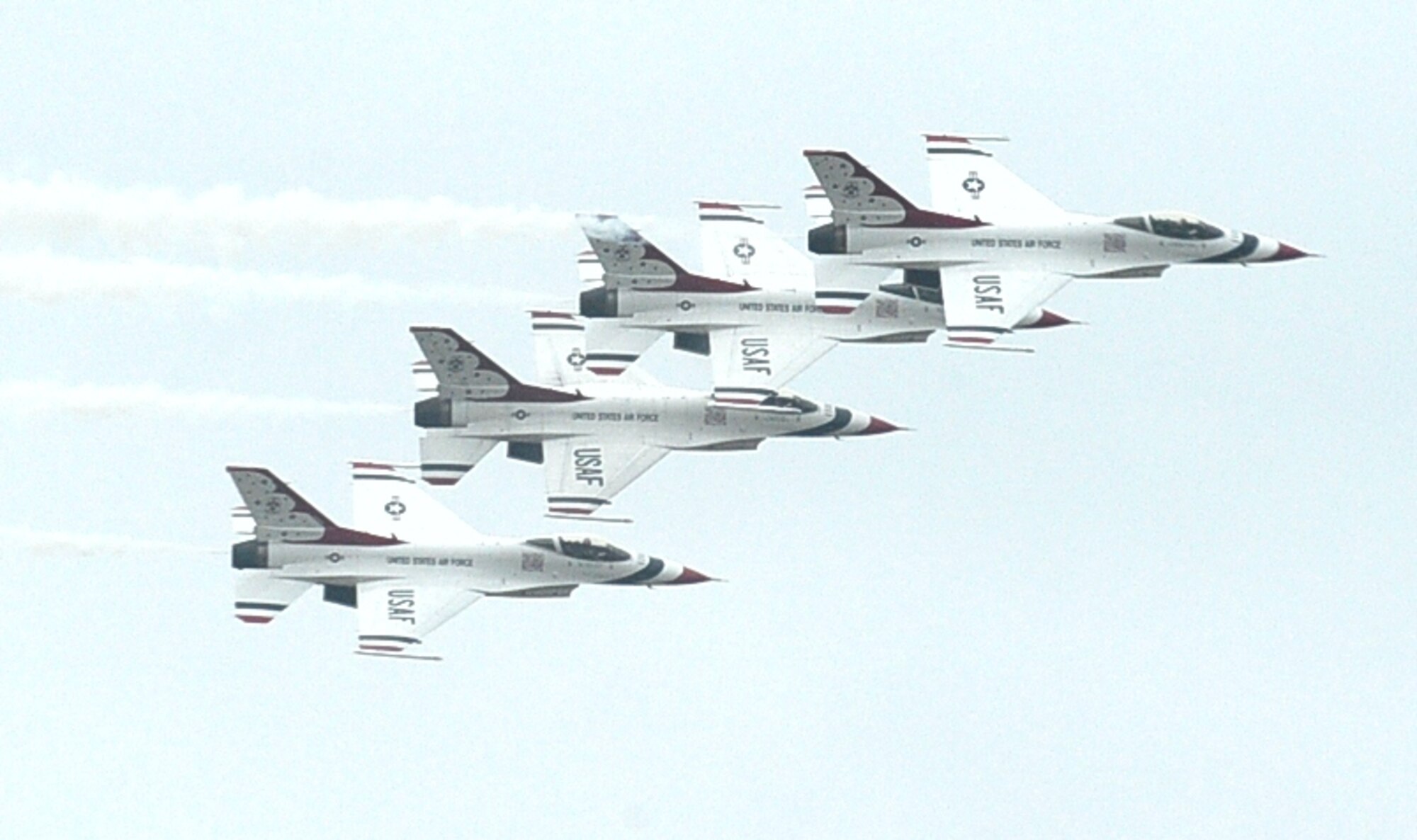 The U.S. Air Force Thunderbirds perform their 2,000th official demonstration in the F-16 Flying Falcon during the Wings Over Columbus Open House and Air Show at Columbus Air Force Base, Miss., April 5, 2014. The Thunderbirds have flown the F-16 since August 1982, more than half of the team's history. (U.S. Air Force Photo/Senior Airman Kaleb Snay)