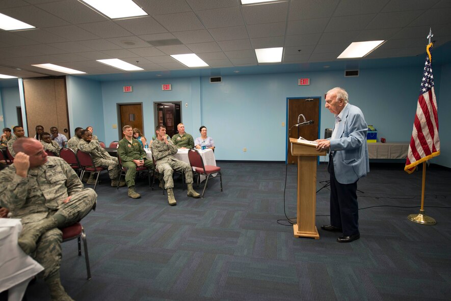 George Aigen, U.S. Army corporal during World War II, speaks on his experiences at Dachua concentration camp at Moody Air Force Base, Ga., April 28, 2014.  Dachua was located near Munich, Germany, and accounted for nearly 32,000 confirmed deaths in addition to thousands that were unconfirmed. (U.S. Air Force photo by Airman Dillian Bamman/Released) 