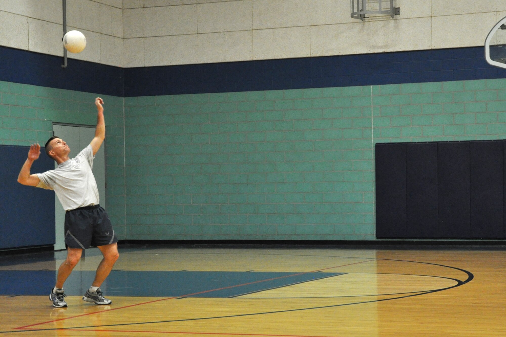 GOODFELLOW AIR FORCE BASE, Texas – Col. Brendon Harris, 17th Training Group Commander, serves during a volleyball match with the Airman Leadership School Class 14-C at the Mathis Fitness Center April 22. The eagles and chiefs won the volleyball match with two consecutive wins, but not without the ALS class winning one round. (U.S. Air Force photo/ Airman 1st Class Breonna Veal)