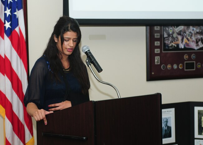 Jagreet Sekhon, Yuba City High School student, reads her essay to Team Beale during the Holocaust remembrance breakfast at the Recce Point Club on Beale Air Force Base, Calif., May 1, 2014. Sekhon was the 2014 Beale Air Force Base Holocaust Remembrance Essay Award winner. (U.S. Air Force photo by Senior Airman Allen Pollard/Released)
