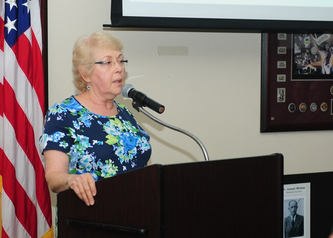 Maria Winkler, daughter of Dr. Joseph Winkler, a holocaust survivor, speaks to Team Beale during the Holocaust Remembrance Breakfast at the Recce Point Club on Beale Air Force Base, Calif., May 1, 2014. During the event Winkler told stories of her father’s life during the holocaust. (U.S. Air Force photo by Senior Airman Allen Pollard/Released)