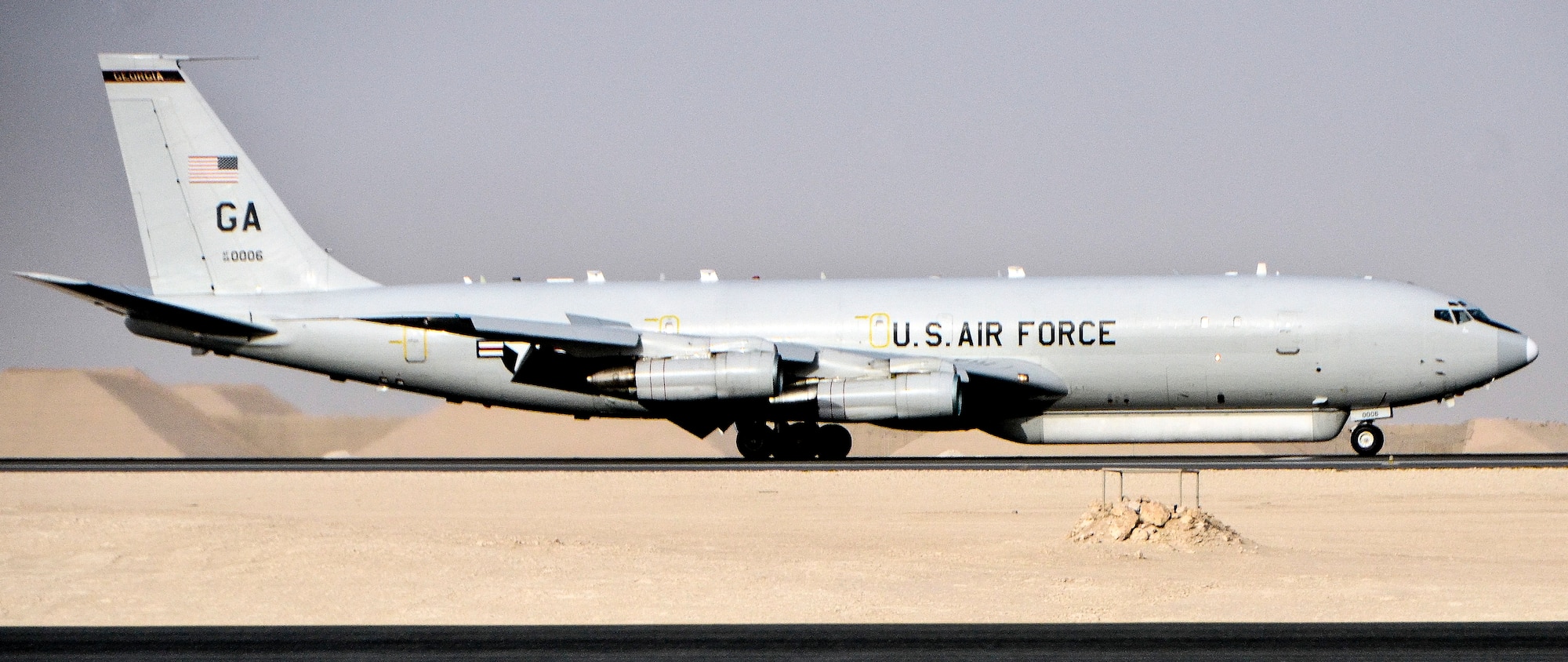 An E-8C Joint Surveillance Target Attack Radar System sits on a taxiway at Al Udeid Air Base, Qatar, May 1, 2014, after reaching a milestone of 100,000 flying hours to include more than 88,000 hours in the U.S. Central Command area of responsibility since 2001. The JSTARS mission is to provide ground commanders with intelligence, surveillance and reconnaissance air power to boost force protection, defensive operations, over-watch and combat search and rescue missions throughout the AOR.  (U.S. Air Force photo/Senior Airman Jared Trimarchi)