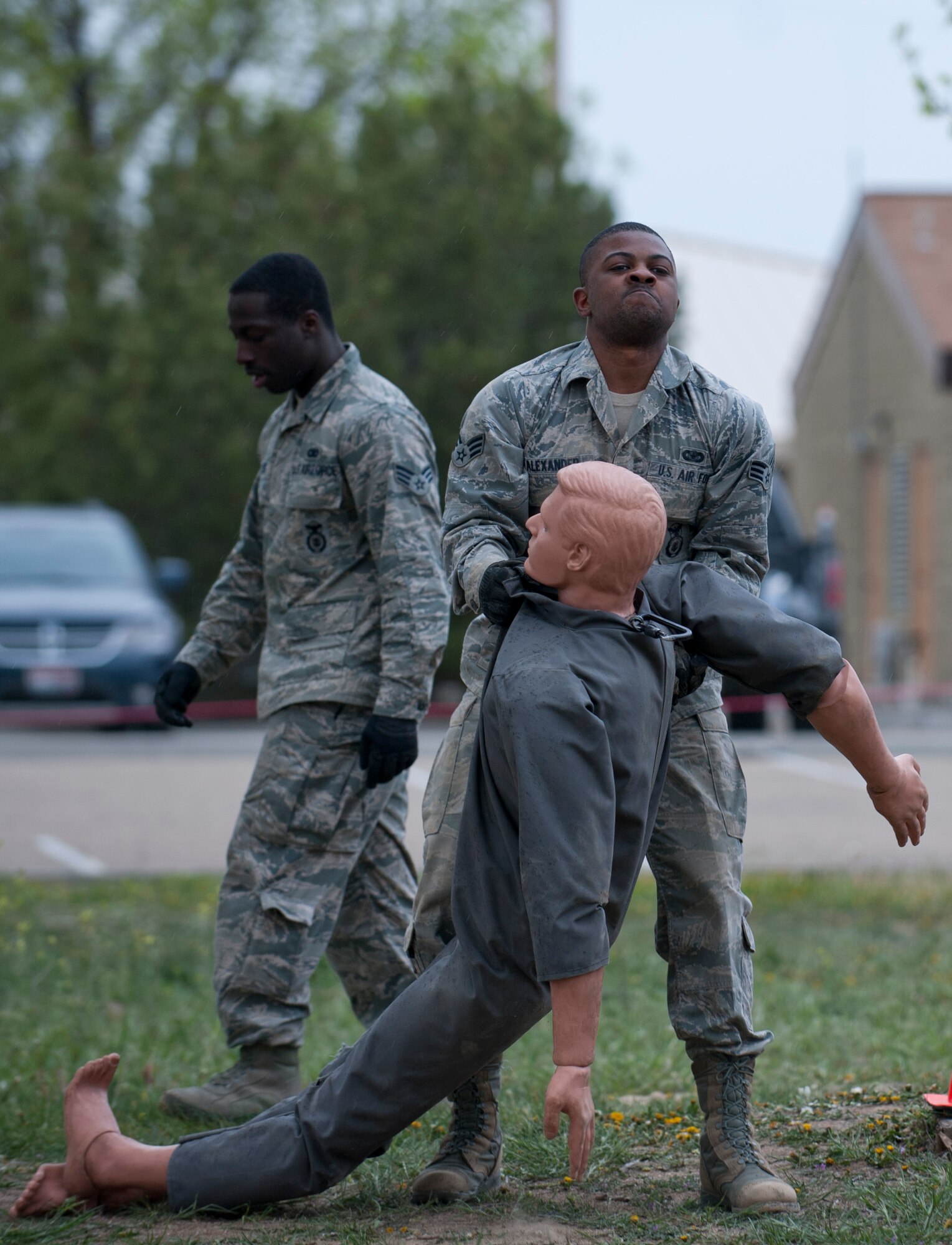 Senior Airman Jahvaun Alexander, 366th Security Forces Squadron staff armorer, lifts a rescue dummy, April 22, 2014, at Mountain Home Air Force Base, Idaho. Each flight in the SFS participated in the Defenders Edge Resiliency Challenge as part of April’s monthly training plan. (U.S. Air Force Photo by Airman 1st Class Brittany A. Chase/Released)