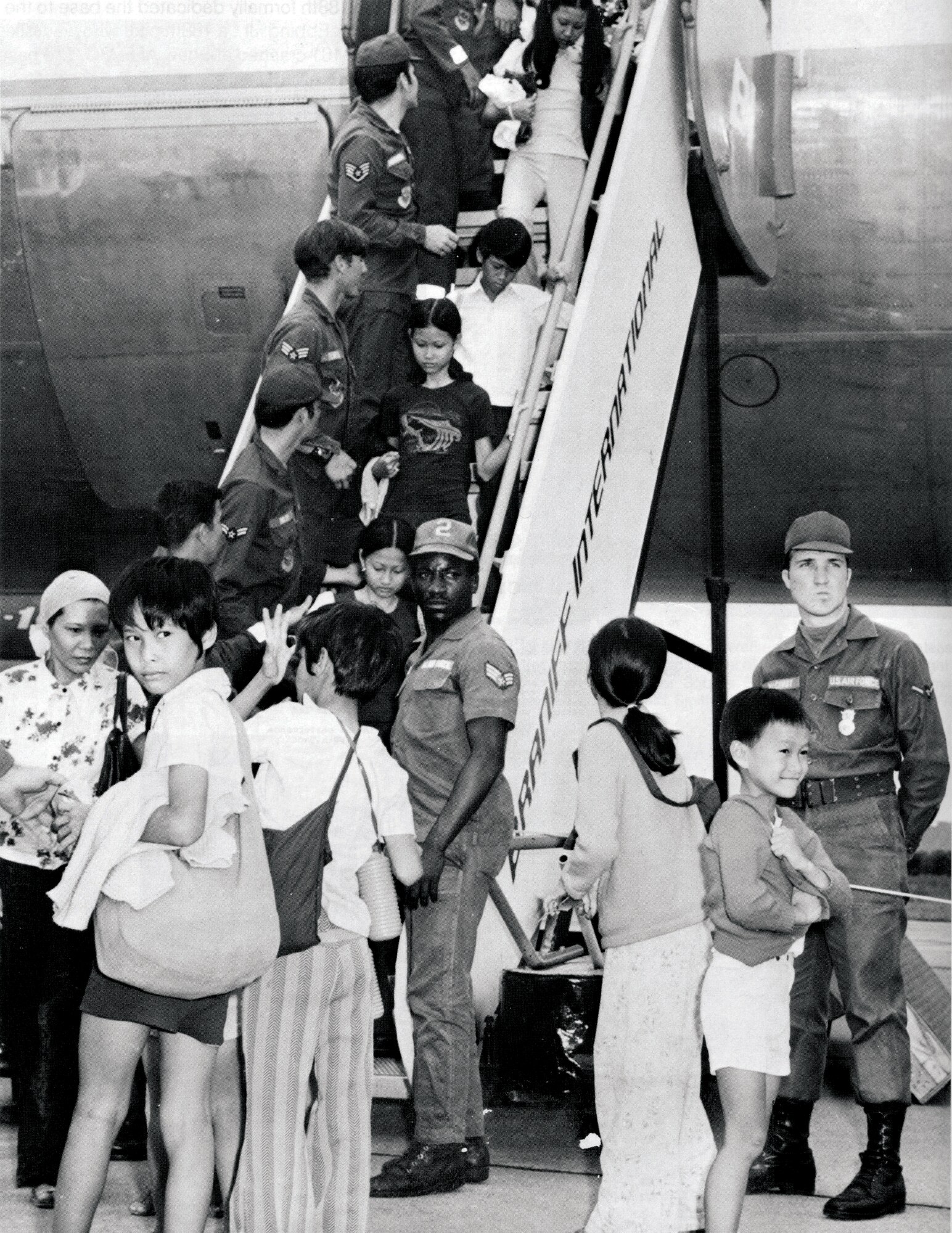 The first of many transport aircraft arrive at Ebbing Air National Guard Base, Fort Smith, Ark., on May 2, 1975. The transports were part of the Vietnamese Airlift also known as Operation New Life. The Vietnamese refugees were brought in through the 188th Tactical Fighter Group. The Indochinese refugees were then transferred to temporary housing at Fort Chaffee, Ark. May is Asian-Pacific American Heritage Month and honors the contributions they have made in their service to the nation. A number of the refugees and their children went on to serve in the U.S. military. (Courtesy photo)