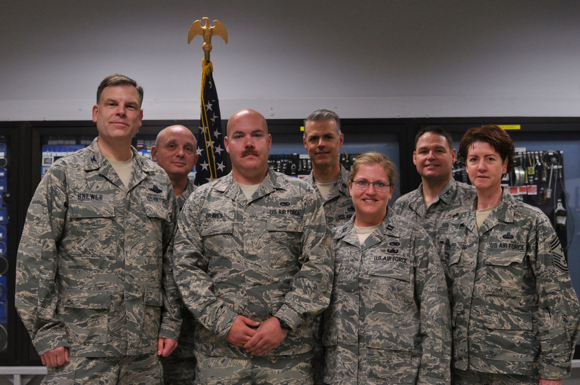 Senior Airman Simon Graves, a 314th Aircraft Maintenance Squadron aircraft maintenance journeyman, is congratulated by his leadership for winning the 2013 Lt. Gen. Leo Marquez Award April 24, 2014, at Little Rock Air Force Base, Ark. Graves proved himself to be an excellent maintenance technician, repairing 175 maintenance discrepancies and leading his team to a 100 percent quality assurance personnel evaluation in April 2013. (U.S. Air Force photo by Senior Airman Regina Agoha)