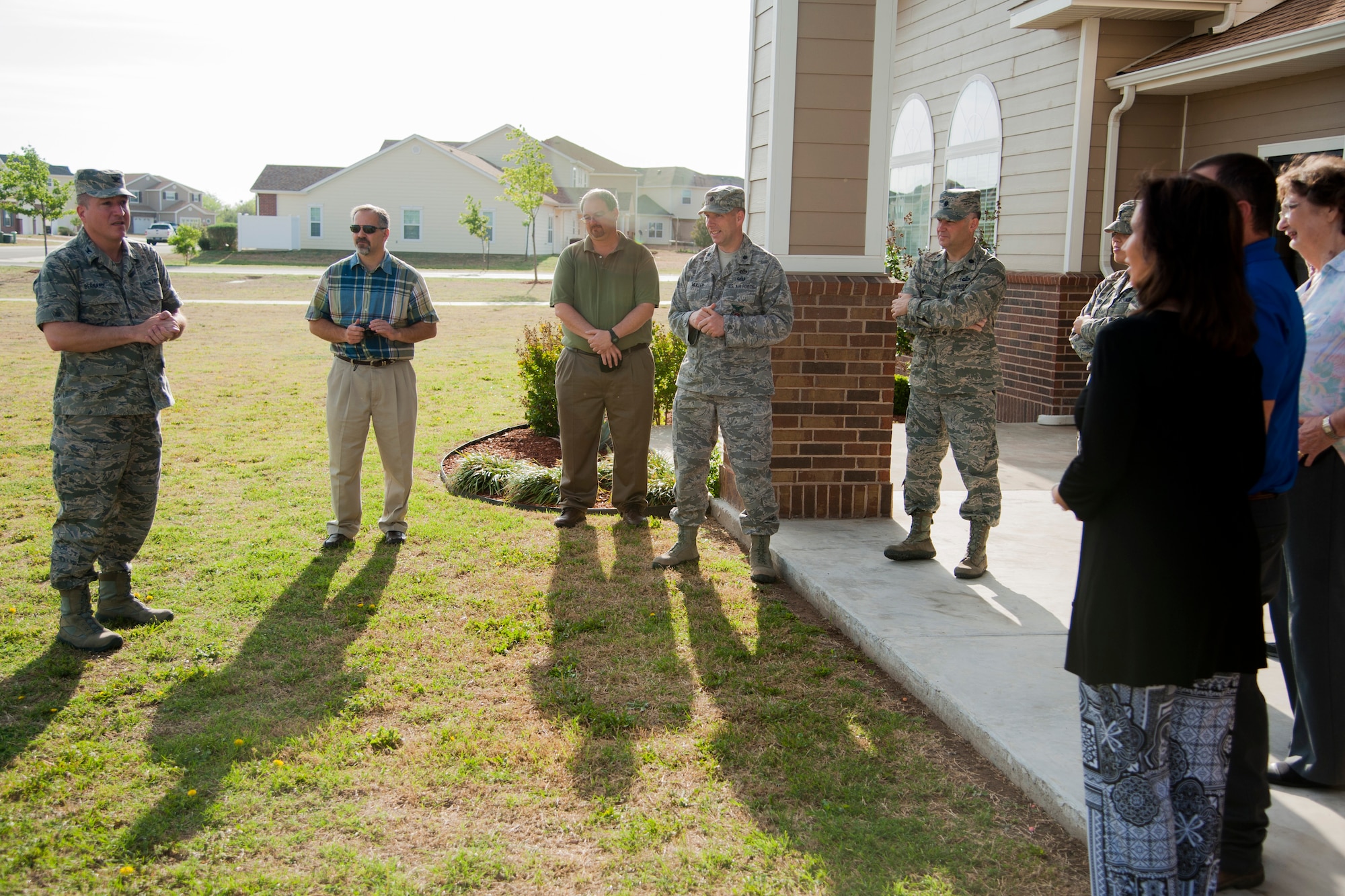 SAN ANGELO, Texas -- Col. Dominic J. Bernardi, left, 17th Mission Support Group Commander, talks about the importance of Earth Day in off-base housing April 23. This year, the Air Force Earth Day activities primarily focused on sustainability. (U.S. Air Force photo/Senior Airman Michael Smith)