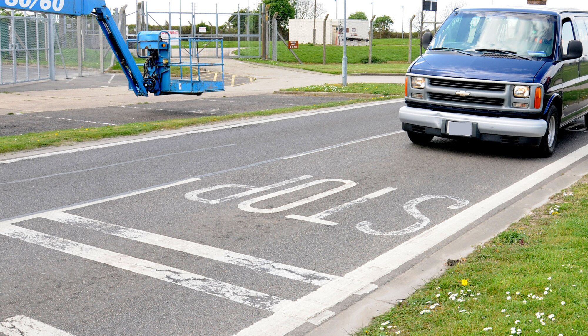 An Air Force vehicle comes to a halt at a stop sign April 11, 2014, on RAF Mildenhall, England. A portion of South Perimeter Road is in close proximity to Taxiway Bravo and road users must give way to aircraft. Anyone failing to stop for a red perimeter control light or make a complete stop for the taxiway or South Perimeter Road stop sign will be guilty of an offense and given four points on their 3rd AF driver's license. (U.S. Air Force photo by Gina Randall/Released)