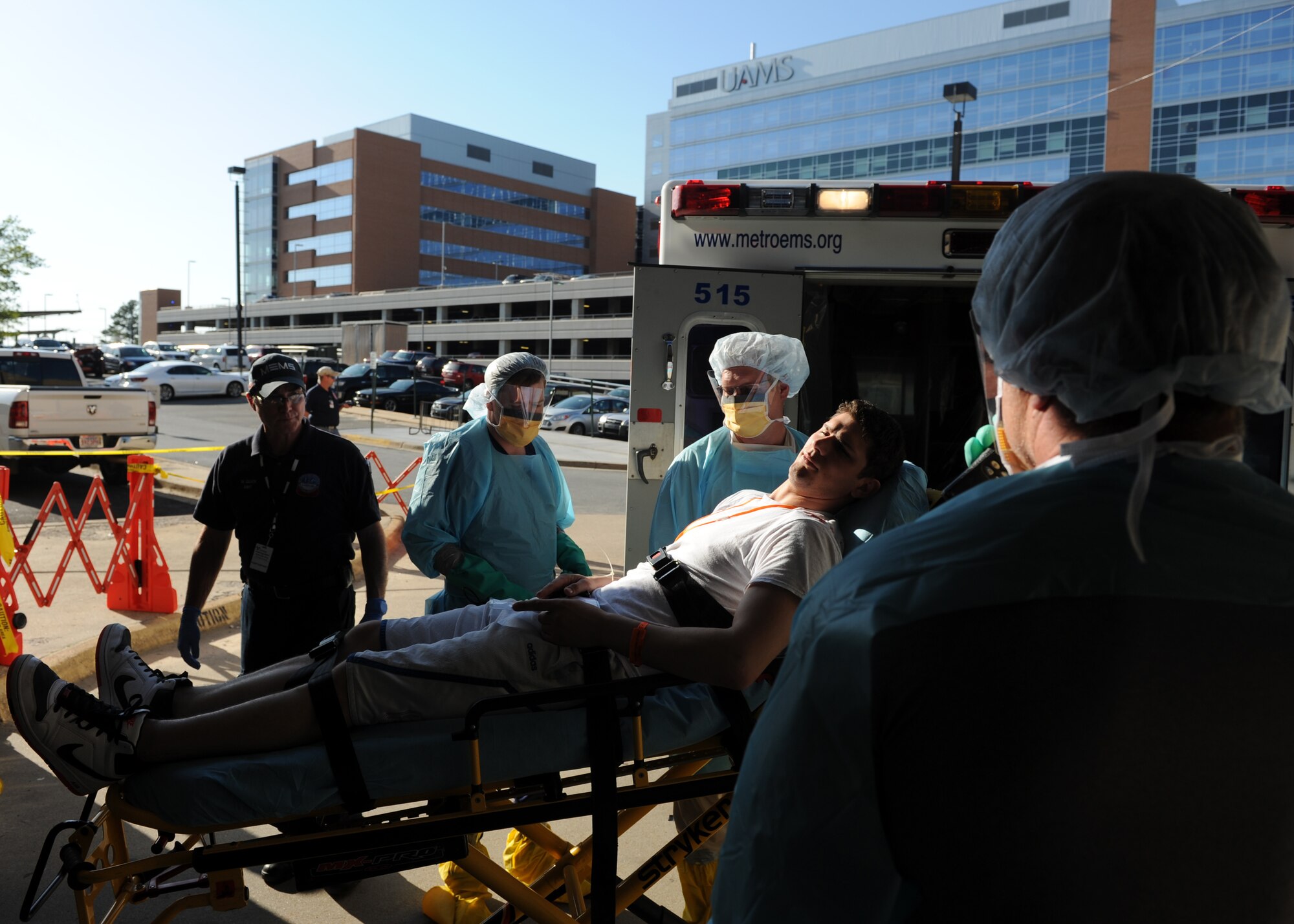 A Little Rock Air Force Base Airman lays on a gurney as a simulated victim during a major accident response exercise at the University of Arkansas for Medical Sciences campus April 22, 2014. The large-scale exercise was supported by volunteers from Little Rock AFB as well as multiple local, state and federal agencies across the state of Arkansas. (U.S. Air Force photo by Airman 1st Class Scott Poe)

