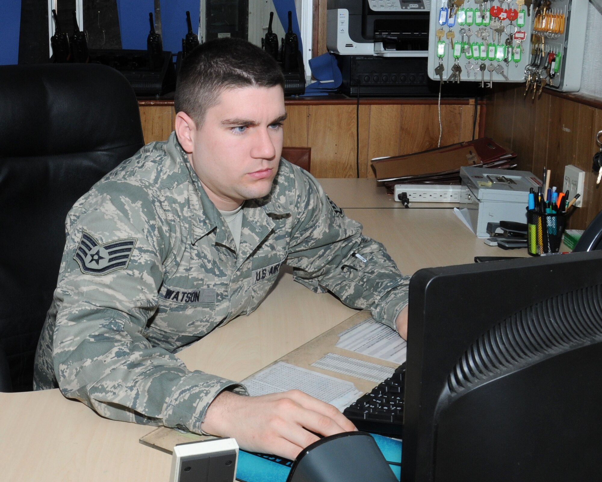 U.S. Air Force Staff Sgt. Jonathan Watson, 100th Logistics Readiness Squadron Fuels Service Center controller from West Frankfort, Ill., dispatches a refuel operation April 22, 2014, on RAF Mildenhall, England. Watson takes fuel requests from the mission operations control centers and coordinates fuels operations on the flightline. MOCC is the main focal point for all flightline operations. They control the whole scope of the flying mission from the ground. They also communicate directly with the crews for fuel requests, the 100th Maintenance Squadron Aerospace Ground Equipment requests, and transient aircraft requests. (U.S. Air Force photo by Gina Randall/Released)