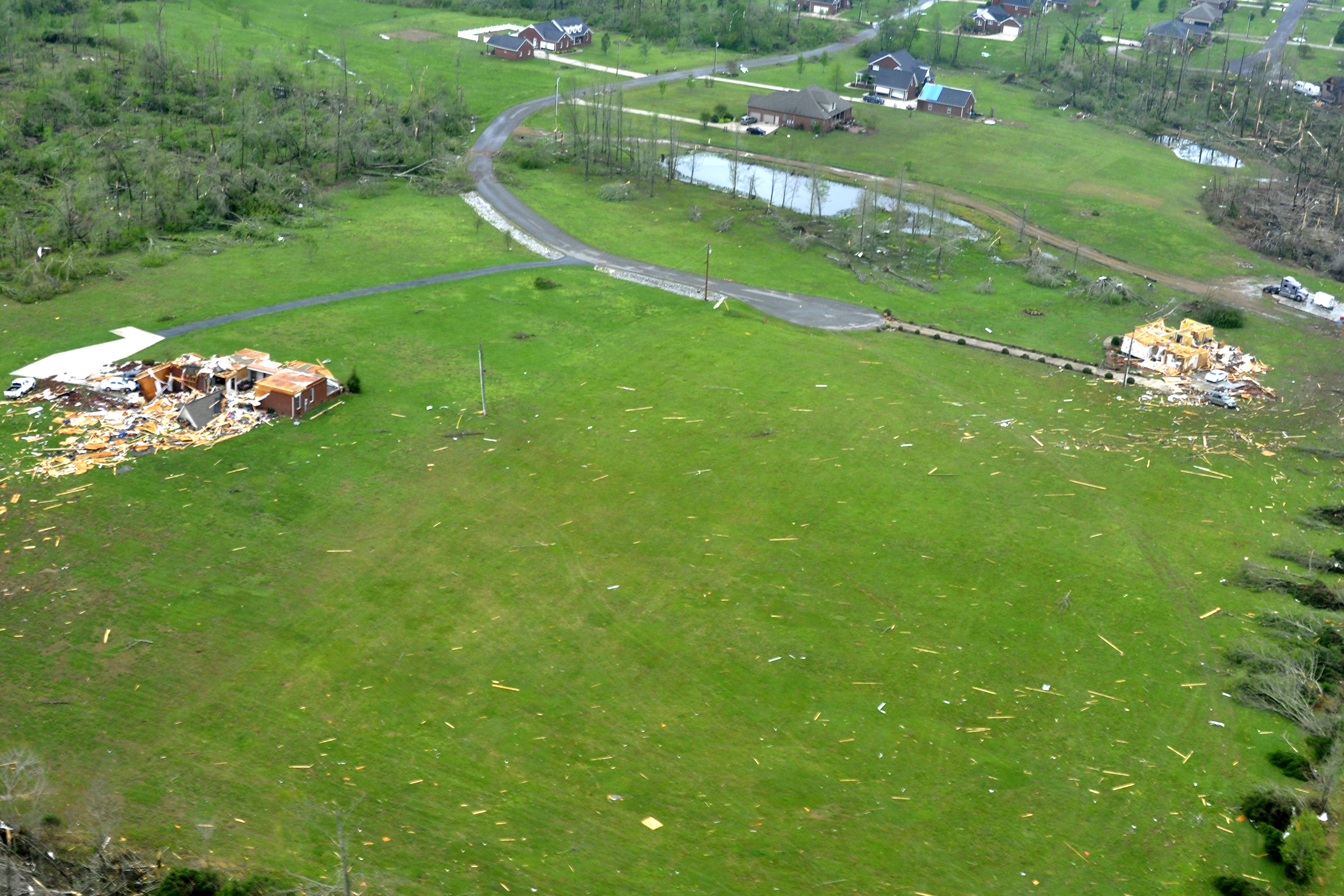 An aerial view shows tornado damage to homes in Fayetteville, Tenn