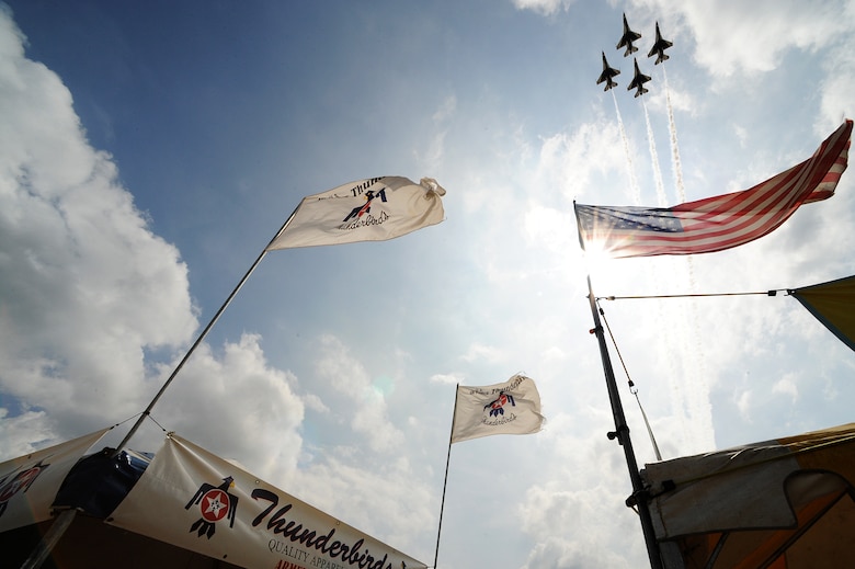 The U.S. Air Force Thunderbirds perform the Diamond Opener during the Defenders of Liberty Air show April 26, 2014, at Barksdale Air Force Base, La. The Thunderbirds are the Air Force’s precision flying demonstration team, who fly red, white and blue F-16 Fighting Falcons. (U.S. Air Force photo/Staff Sgt. Larry E. Reid Jr.)