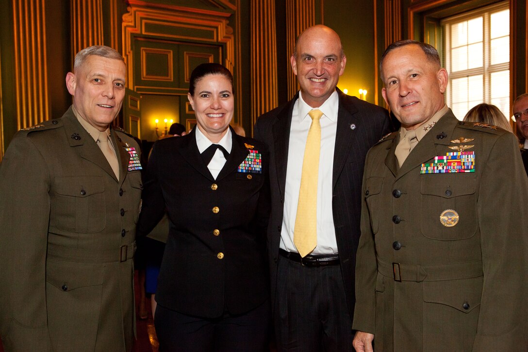 The Assistant Commandant of the Marine Corps, Gen. John M. Paxton, Jr., left, poses for a photo during the Heroes of Military Medicine Awards Dinner in Washington, D.C., April 1, 2014. Gen. Paxton helped present the United States Navy Hero of Military Medicine Award to U.S. Navy Captain Jack W. Tsao, not shown, that evening. (U.S. Marine Corps photo by Cpl. Tia Dufour/Released)