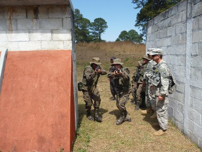 Georgia Army National Guardsmen supervise CQB/MOUT [close quarters combat and military operations on urbanized terrain] training with two Soldiers from the Guatemalan Interagency Task Force in order to build capacity and to enhance the Honduran's capability in combating transnational criminal organizations and drug trafficking organizations this February in Guatemala. 