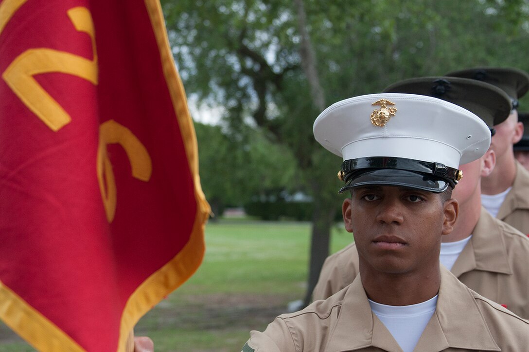 Pfc. Ramir M. Reed, the honor graduate for platoon 1026, stands at parade rest before marching onto the parade deck at graduation here, May 2, 2014. Reed, a Melbourne, Fla. native, was recruited by Sgt. Leon B. Williams, a recruiter from Marine Corps Recruiting Substation Melbourne, Recruiting Station Orlando. Recruit training signifies the transformation of a civilian to a United States Marine. Upon graduation, the newly-minted Marines will receive ten days of leave before attending the School of Infantry East, Camp Gieger, N.C. The Marines will be trained in basic infantry skills and ensure that the Marines are combat-ready. (Official Marine Corps photo by Lance Cpl. John-Paul Imbody)

