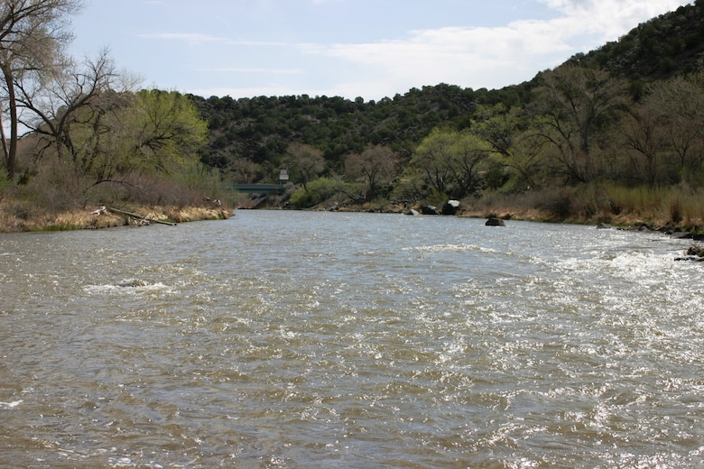 EMBUDO, N.M., -- Looking upstream on the Rio Grande from the streamgage.  The streamgage here was the first U.S. Geological Survey streamgage in the United States and was established in 1889. 