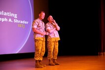 Brig. Gen. Frank Kelley (right), commander of Marine Corps Systems Command, introduces Col. Joseph Shrader at the April 30 MCSC Town Hall at Marine Corps Base Quantico, Va. Shrader has been selected for promotion to brigadier general and will assume command of MCSC in July.