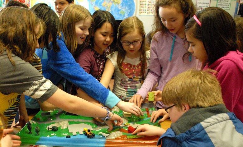 Janet Post and Danielle Shack, regulatory specialists in the Regulatory Division, visited Turnagain Elementary School April 23 to meet with fifth and sixth-grade students to talk about wetlands and promote their studies in science, technology, engineering and mathematics. The children learned about different types of wetlands around Alaska and how they help protect from floods and pollutants. The students also felt and touched different animal pelts, bones and hides that use wetlands for their habitat.