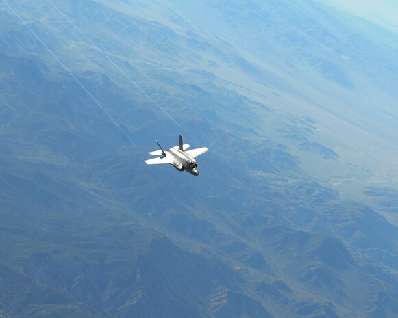 A U.S. Air Force F-35 Lightning II assigned to the 31st Test and Evaluation Squadron from Edwards Air Force Base, Calif. soars through the sky over the California desert April 29, 2014. The F-35 is a 5th generation multi-role fighter capable of dominating combat air-space with radar-evading stealth and supersonic speed. (U.S. Air Force photo by Airman 1st Class Thomas Spangler)