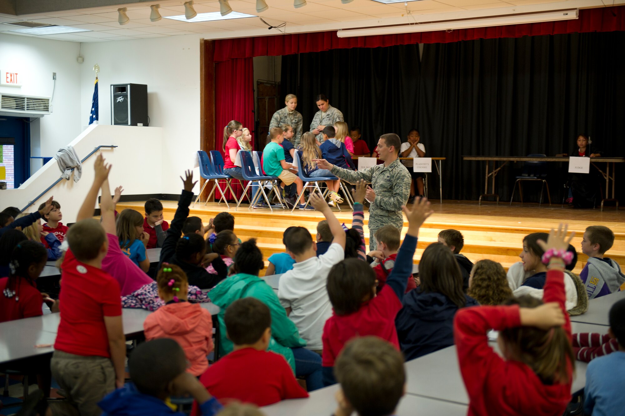 Capt. Vincent Defabo, 325th Fighter Wing assistant judge advocate chief, asks questions at Tyndall Elementary May 1, during an educational outreach program for Law Day. (U.S. Air Force photo by Senior Airman Christopher Reel)  