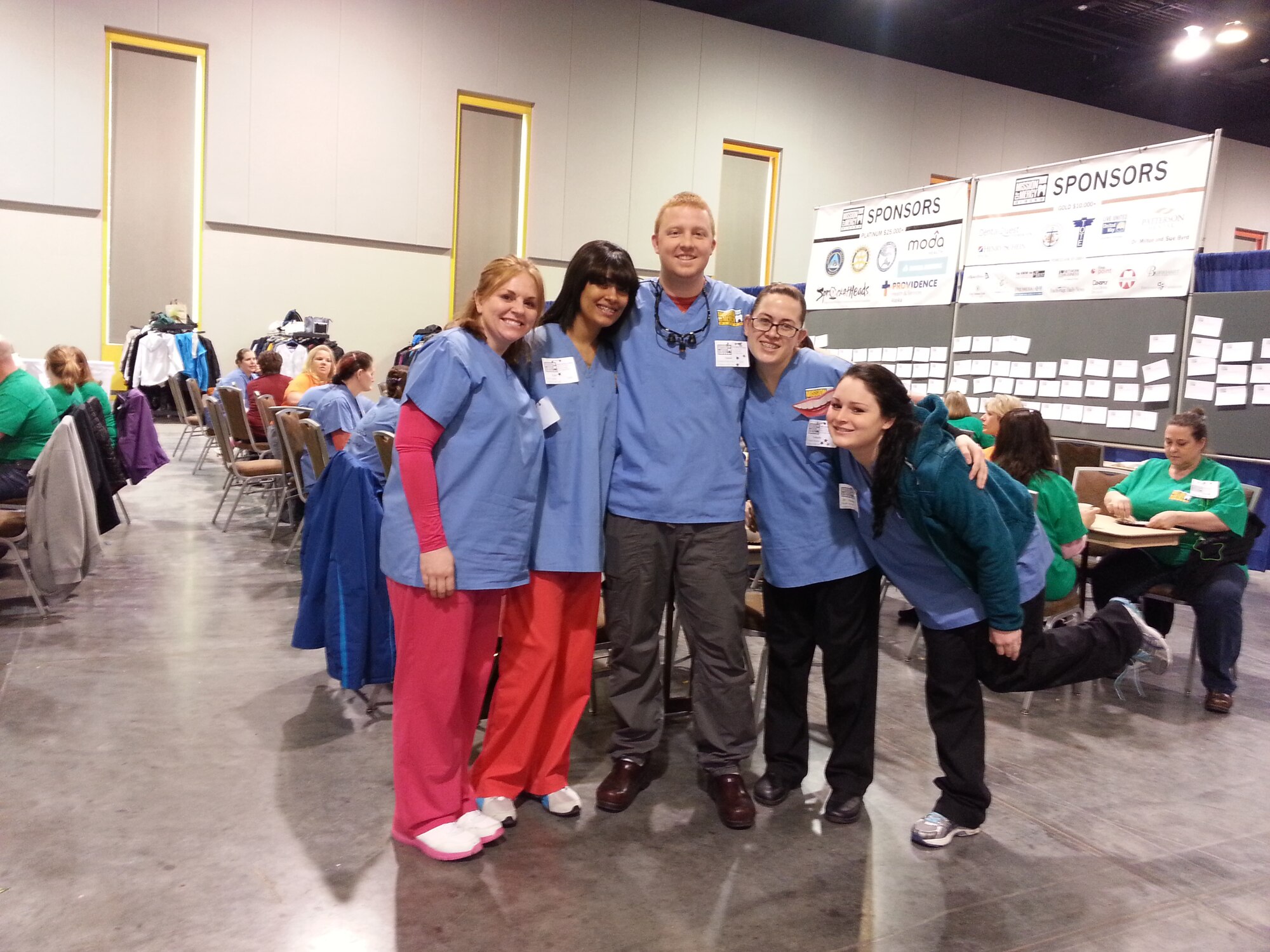 Group photograph of the five 354th Medicial Operations Squadron Icemen who participated in Mission of Mercy Alaska. From Left to Right: Staff Sgt. Amber Green, Senior Airman Kati Lappin, Capt. Daniel Binkowski, Airman 1st Class Yomarly Rosariotorres, Airman 1st Class Nicole Berard. (Courtesy Photo)