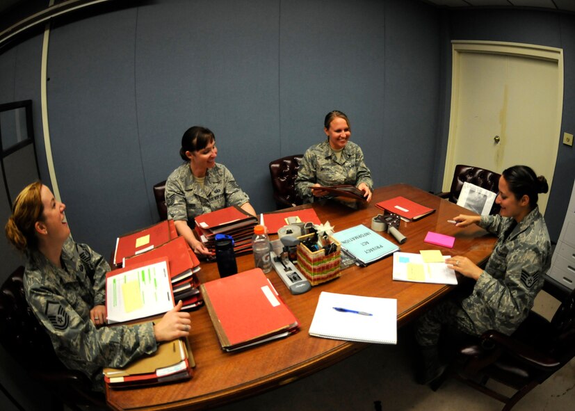 Master Sgt. Michelle Corlett, Tech. Sgt. Nicole Tobin, Tech. Sgt. Abbra Myers, all from the 419th Force Support Squadron, and Staff Sgt. Kristy Zimmerman, from the 96th Force Support Squadron here, review personnel folders as part of the 419th Fighter Wing's two-week annual training.

"This is an opportunity for us to have specific training on assignments and relocations," said Corlett, force management chief in the 419th FSS. "It is important for us to be here because we don't have the volume of assignments and relocations that our active-duty counterparts have. This experience allows us to train extensively on what we wouldn't have been able to do otherwise."

While here, the 419th FSS is also auditing the 96th FSS folders to assist the host squadron and get an in-depth look at their procedures. (U.S. Air Force photo/Senior Airman Allen Stokes)
