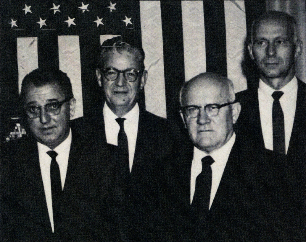 Dr. Carl Romney (far right), Air Force Technical Applications Center assistant technical director, is pictured with fellow AFTAC personnel (pictured left to right): Walter Singlevich, Gerald M. Leies and Doyle Northrup at an undetermined event in 1970. Northrup served as a technical director from July 1959 to 1972; Leies followed Northrup as technical director in 1974 until 1987 when the position was abolished.  He later became AFTAC’s first chief scientist until his retirement in 1988.  Singlevich, a giant in the field of atomic energy and nuclear research, served at AFTAC’s senior scientist throughout the 1980s until his death in 1992.  (Courtesy photo)