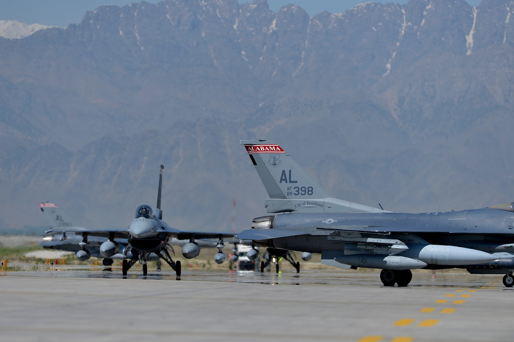 U.S. Air Force F-16 Fighting Falcon from the 100th Fighter Squadron, 187th Fighter Wing Montgomery, Ala. arrive at Bagram Air Base, Afghanistan April 27, 2014. The Guard unit recently replaced the 93rd Fighter Squadron from Homestead Air Reserve Station, Fla. and 301st Fighter Squadron from Naval Air Station Joint Reserve Base, Fort Worth, Texas for the latest deployment rotation. (U.S. Air Force photo by Staff Sgt. Evelyn Chavez/Released)