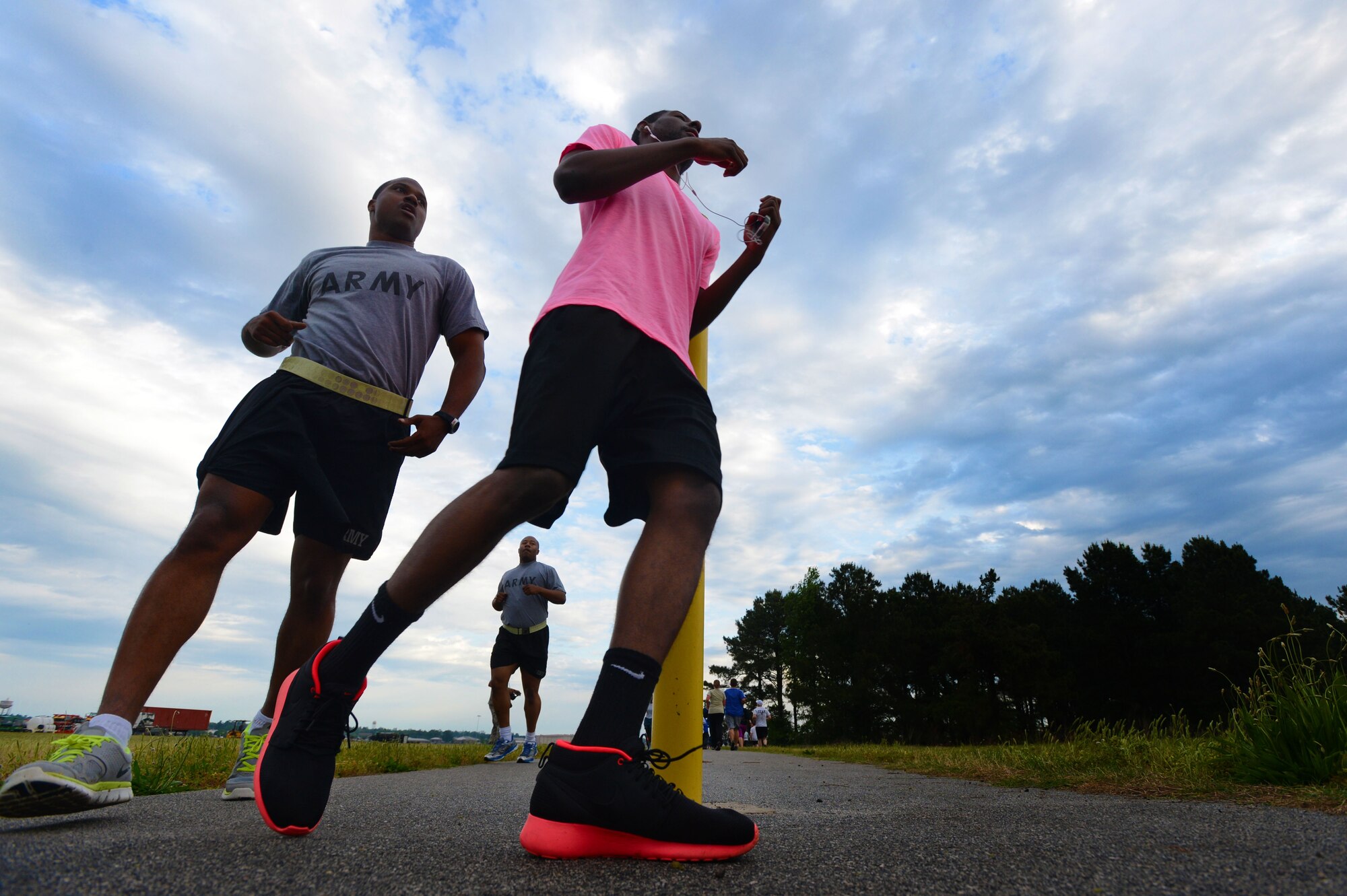 Team Shaw members run a 5K Sexual Assault Prevention and Response run at Shaw Air Force Base, S.C., May 2, 2014. More than 800 people participated in the run to help raise awareness and collect donations for victims of sexual assault and sexual harassment. (U.S. Air Force photo by Airman 1st Class Jensen Stidham/Released) 

