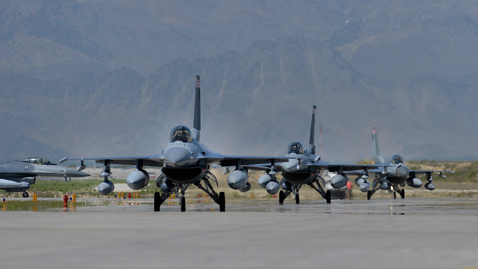U.S. Air Force F-16 Fighting Falcon from the 100th Fighter Squadron, 187th Fighter Wing Montgomery, Ala. arrive at Bagram Air Base, Afghanistan April 27, 2014. The Guard unit recently replaced the 93rd Fighter Squadron from Homestead Air Reserve Station, Fla. and 301st Fighter Squadron from Naval Air Station Joint Reserve Base, Fort Worth, Texas for the latest deployment rotation. (U.S. Air Force photo by Staff Sgt. Evelyn Chavez/Released)