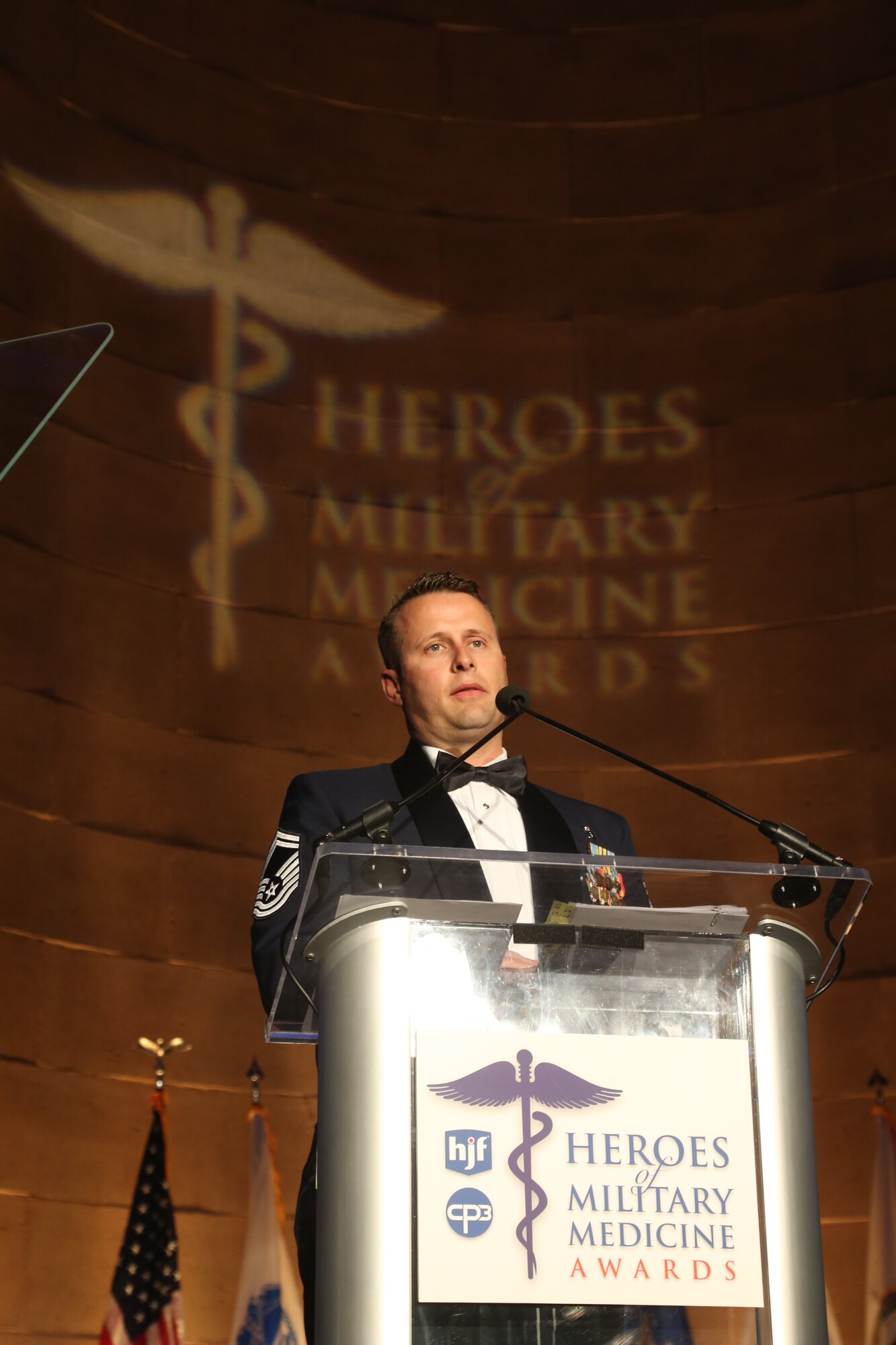 Senior Master Sgt. David Smith, 22nd Force Support Squadron career advisor, gives an acceptance speech after receiving the 2014 Heroes of Military Medicine award, May 1, 2014, Washington, D.C. Smith was recognized for helping revise the Advanced Medic Course lectures, lab procedures, and patient simulation scenarios which prepared more than 300 special operations medics. (courtesy photo)