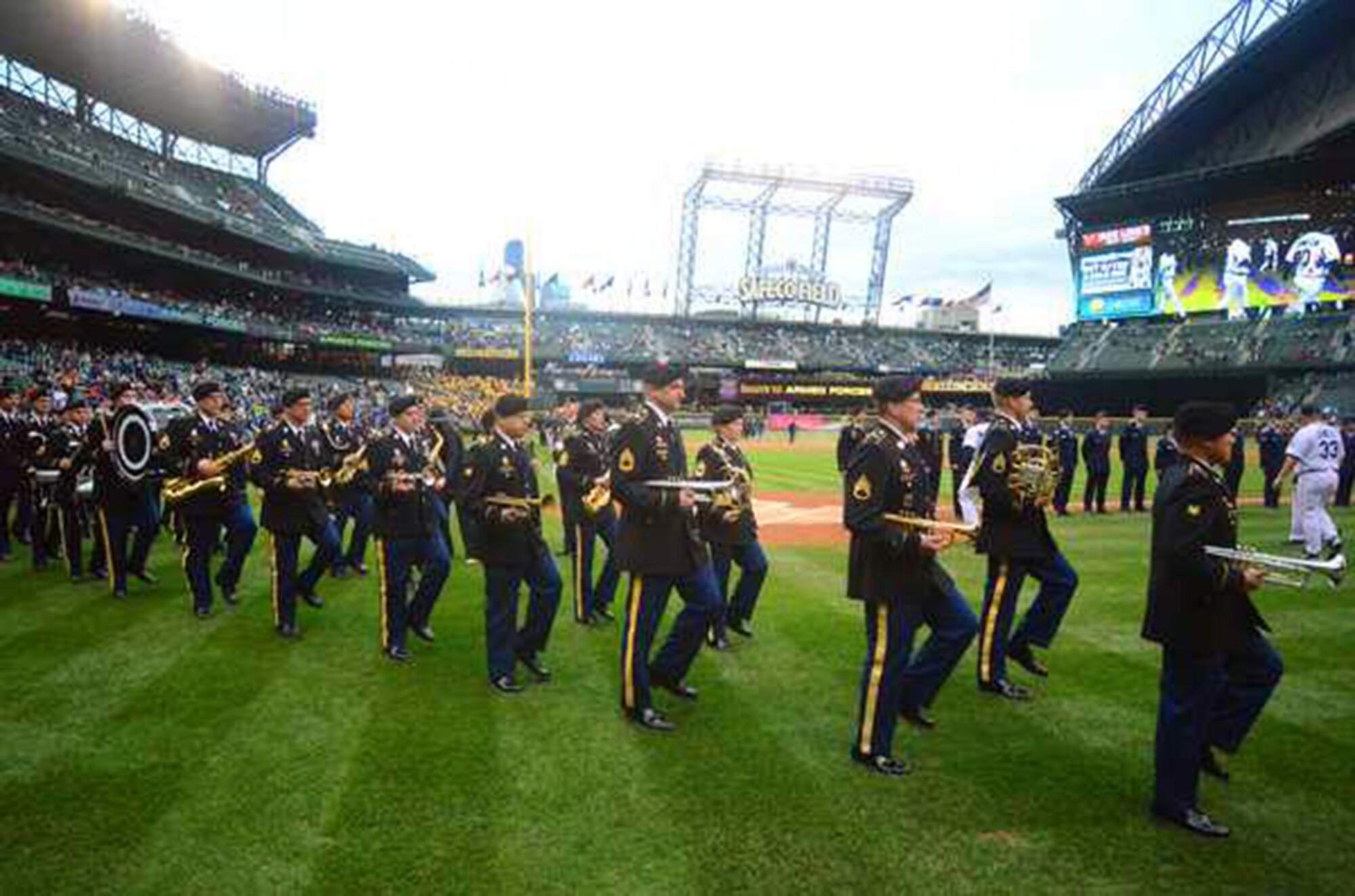 The 56th Army Band from JBLM marches onto Safeco Field in Seattle during the Salute to Armed Forces pre-game ceremonies April 27 before the Mariners hosted the Texas Rangers.(Dean Siemon/Northwest Guardian)