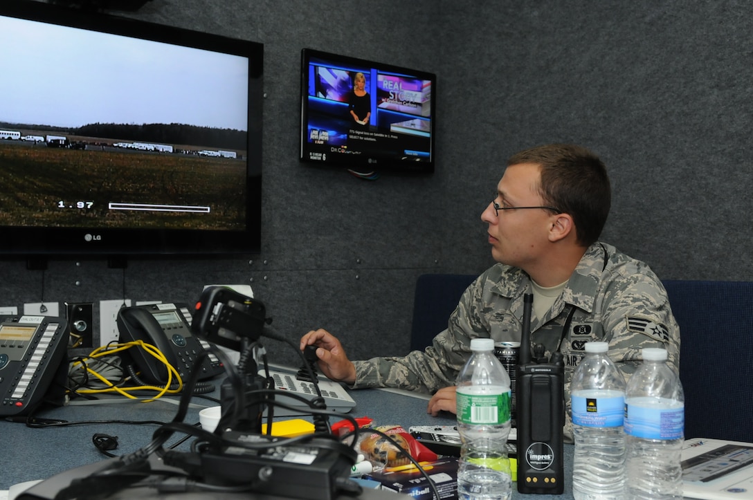 Senior Airman Joseph Manning monitors a camera from the Mobile Emergency Operations Center during the Homeland Response Force exercise on 29 APR 2014. The MEOC is a command and control element for major responses. (New York Air National Guard Photo by Senior Airman Duane Morgan)
