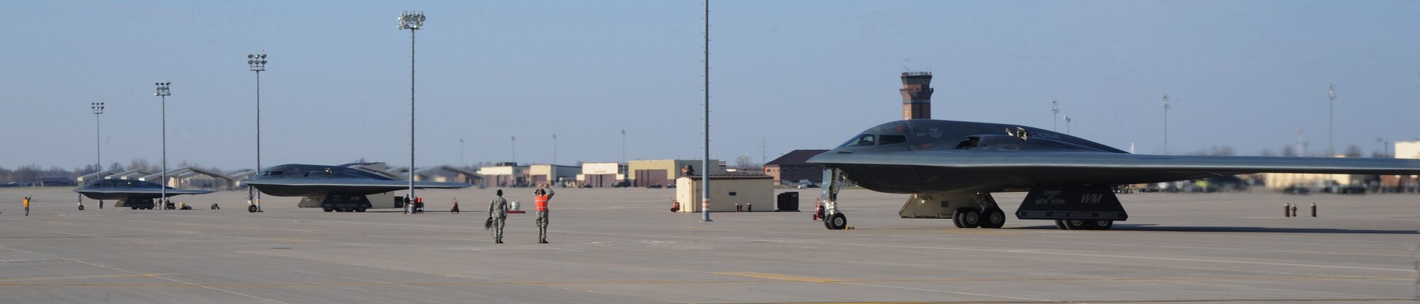 Three B-2 Spirits prepare to taxi, April 8, 2014, at Whiteman Air Force Base, Mo. The B-2’s low-observable, or "stealth," characteristics give it the unique ability to penetrate an enemy's most sophisticated defenses and threaten its most valued, and heavily defended, targets. (U.S. Air Force photo by Senior Airman Bryan Crane/Released)