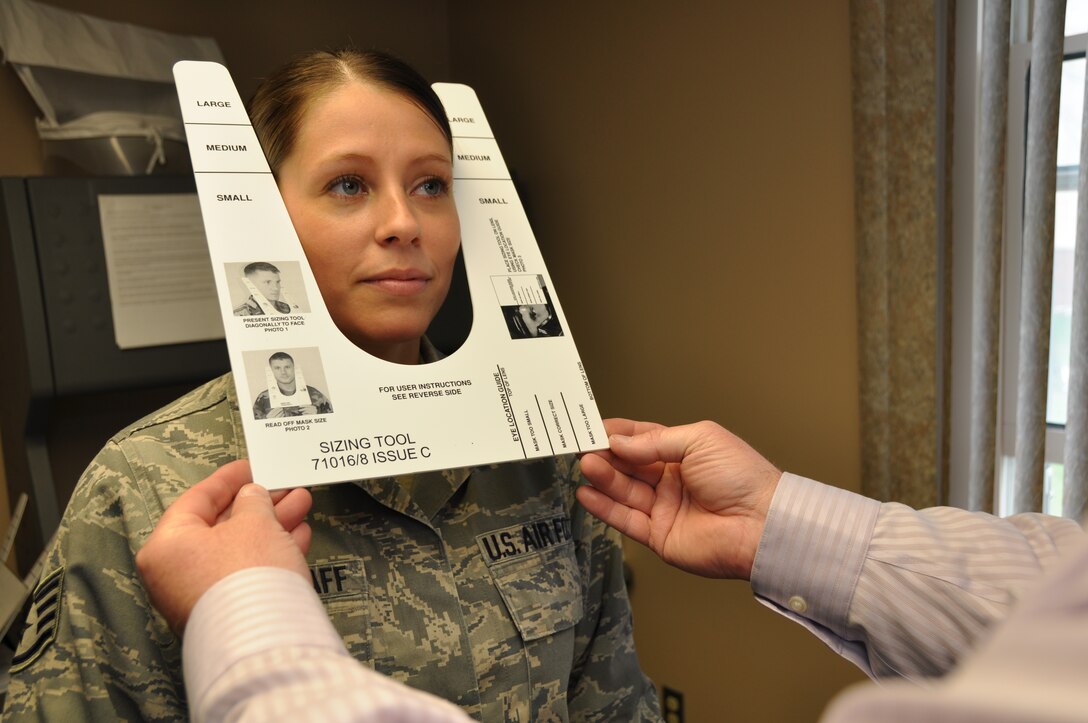 Staff Sgt. Allissa Landgraff, a broadcast journalist with the 911th Airlift Wing Public Affairs Office, is measured for an M-50 Joint Service General Purpose Mask at the Pittsburgh International Airport Air Reserve Station, April 29, 2014. A properly fitted gas mask is essential during a possible chemical, biological or radiological threat. (U.S. Air Force photo by Senior Airman Marjorie A. Bowlden)