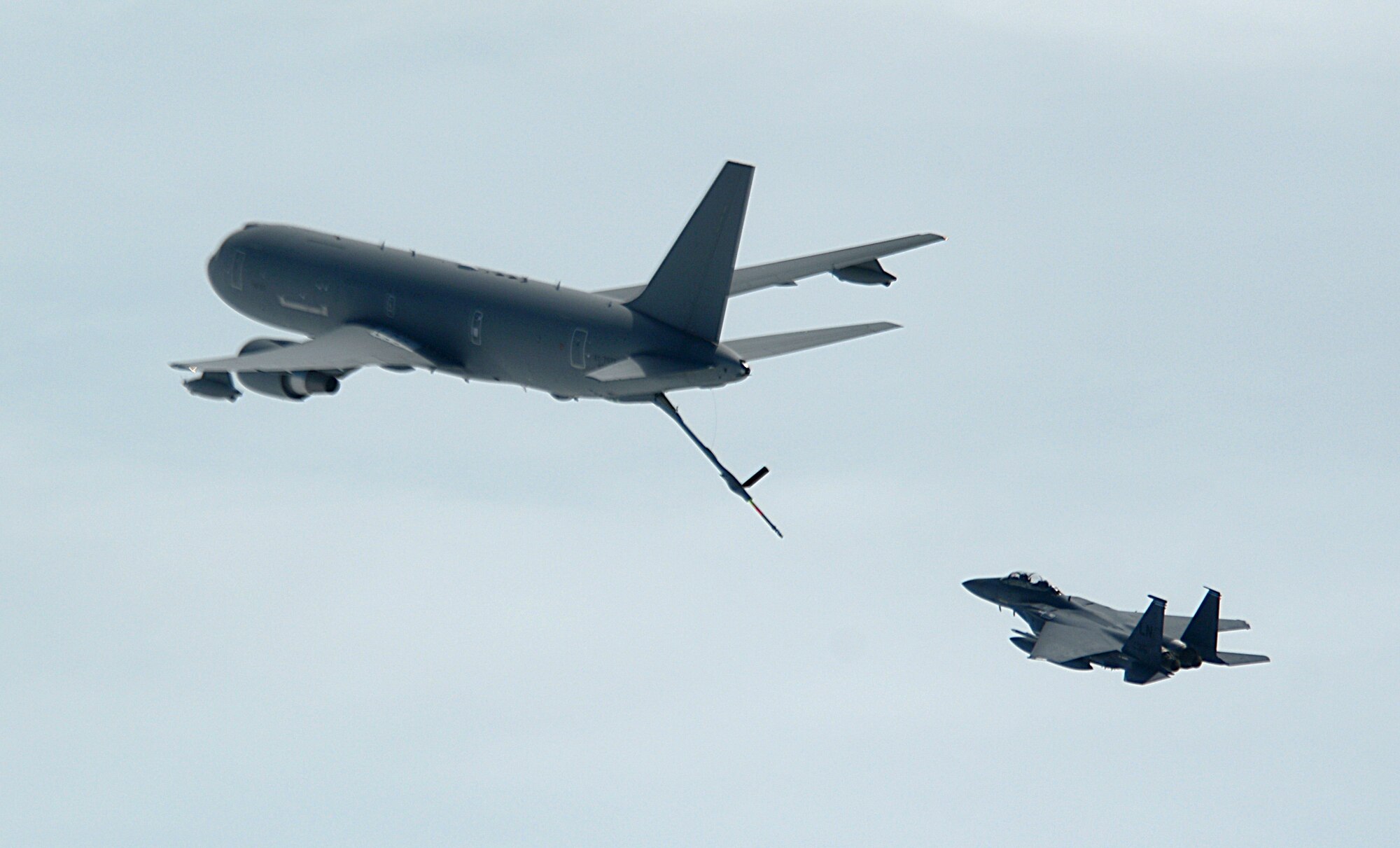 An Italian air force KC-767 practices aerial refueling approaches with an F-15E Strike Eagle assigned to RAF Lakenheath, England, during a formation flight May 1, 2014, off the coast of England. Tankers from different countries perform flights like this together to train on multi-tanker refueling and learn different refueling tactics. (U.S. Air Force photo by Airman 1st Class Dillon Johnston/Released)