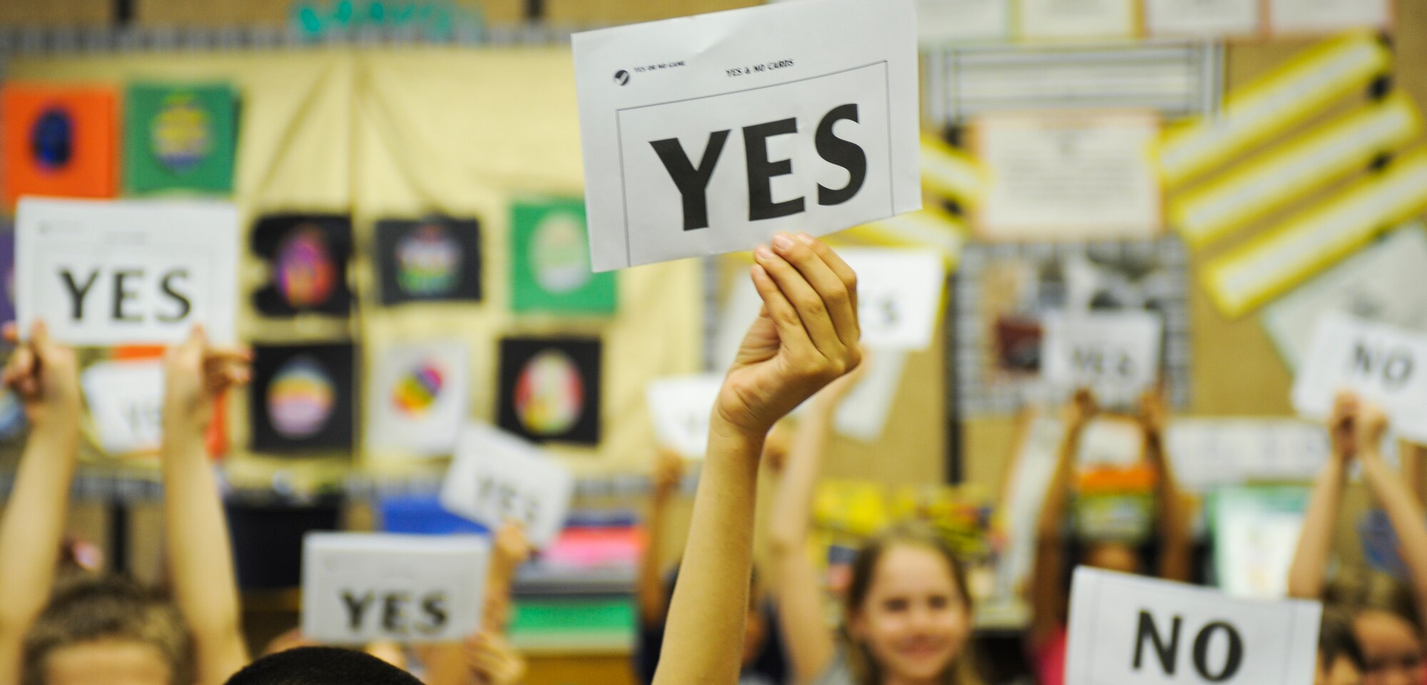 Students vote for their favorite foods during a Law Day visit to Borman Elementary School at Davis-Monthan Air Force Base, Ariz., May 1, 2014. Law Day is meant to emphasize the important role law has in the foundation of the country. (U.S. Air Force photo by Senior Airman Sivan Veazie/Released)