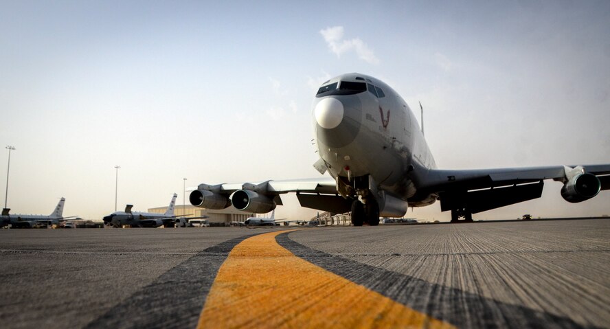 An E-8C Joint Surveillance Target Attack Radar System sits on a taxiway at Al Udeid Air Base, Qatar, May 1, 2014, after reaching a milestone of 100,000 flying hours to include more than 88,000 hours in the U.S. Central Command area of responsibility since 2001. The JSTARS mission is to provide ground commanders with intelligence, surveillance and reconnaissance air power to boost force protection, defensive operations, over-watch and combat search and rescue missions throughout the AOR.  (U.S. Air Force photo/Senior Airman Jared Trimarchi)