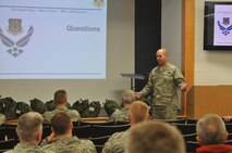 Col. James Dignan, 910th Airlift Wing Commander, welcomes and briefs members of the Air Force Reserve Command Unit Effectiveness Inspection team here, May 1, 2014 The UEI team, led by Brig. Gen. John J. Mooney III, Inspector General, Headquarters Air Force Reserve Command, arrived at Youngstown to perform a UEI capstone visit. The UEI is a new inspection concept piloted in U.S. Air Forces in Europe. U.S. Air Force photo/Eric M. White.