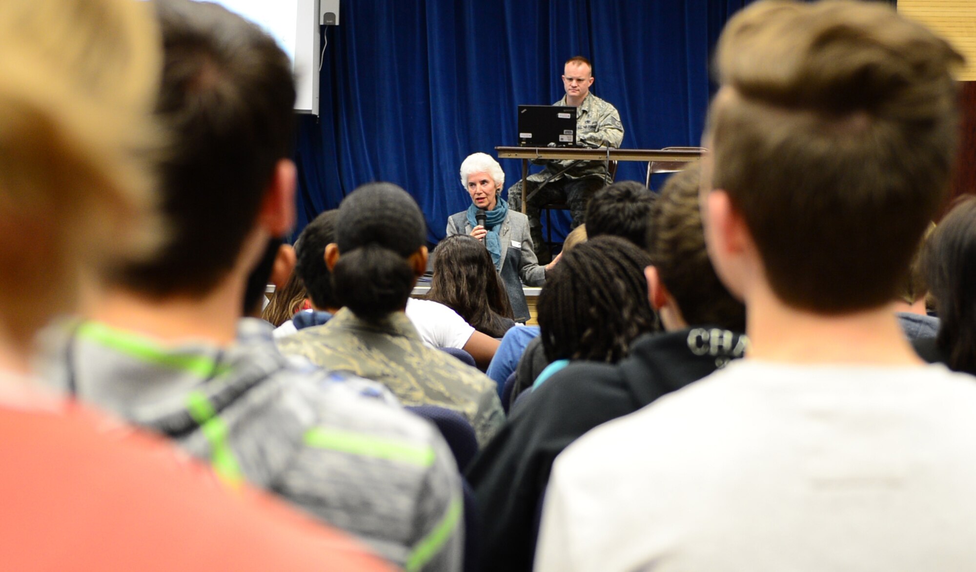 Eva Clarke, who was born in a concentration camp, speaks to the students of Lakenheath High School during Holocaust Remembrance Week at Royal Air Force Lakenheath, England, April 30, 2014. Clark recounted her mother's experiences held in the concentration camp, Terezin (formerly named Theresienstadt), in the former Czech Republic during World War II. (U.S. Air Force photo by Airman 1st Class Dawn M. Weber/Released)