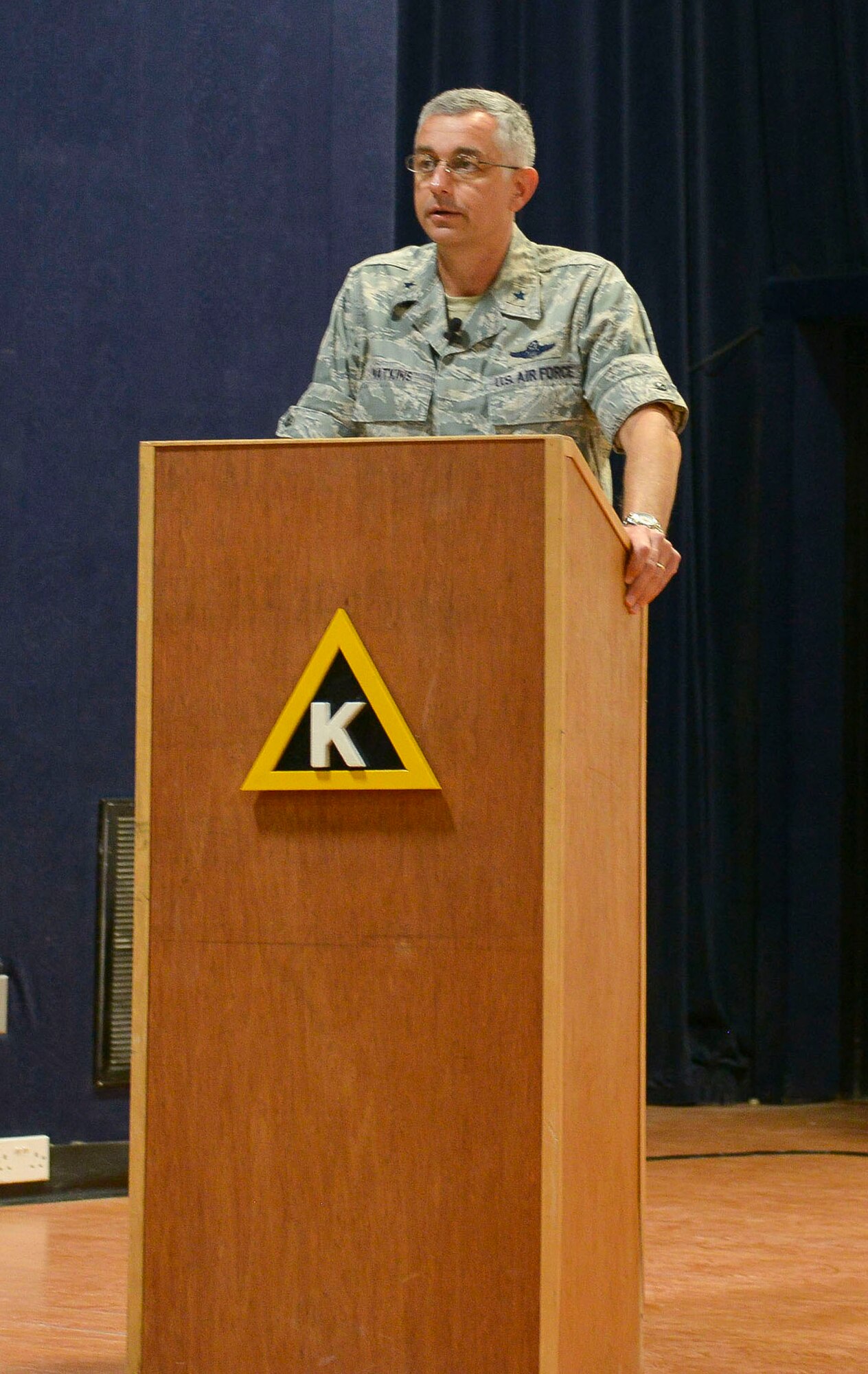 Brig. Gen. Roger H. Watkins, 379th Air Expeditionary Wing commander, speaks to the audience during the Sexual Assault Prevention and Response wing stand down day at Al Udeid Air Base, Qatar, April 29, 2014. The 379 AEW took part in an Air Force wide SAPR event, which started with a wing commander’s call. The briefing was built, developed and approved by the Chief of Staff and the SAPR office at the Pentagon. In the coming weeks each squadron will participate in small group training sessions due  to the high operations tempo in support of Operation Enduring Freedom. (U.S. Air Force photo/Senior Airman Colin Cates)