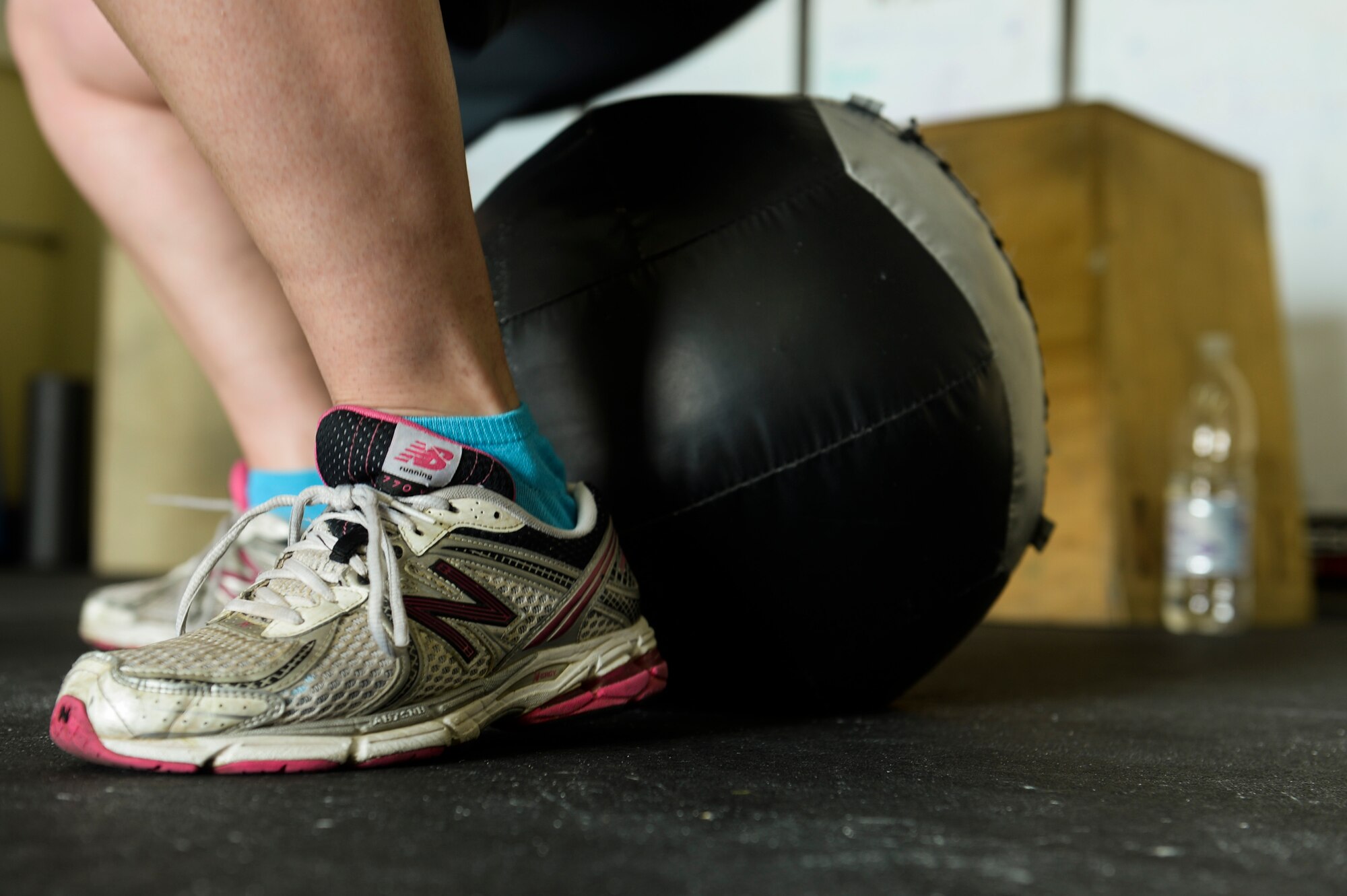 U.S. Air Force Staff Sgt. India Smith, a 372nd Training Squadron Detachment 17 NCO in charge of knowledge operations, performs a squat during a half “Murph” workout April 25, 2014, at Spangdahlem Air Base, Germany. The “Murph” is a workout named in the memory of U.S. Navy Lt. Michael Murphy who was killed in Afghanistan in 2005. (U.S. Air Force photo by Senior Airman Rusty Frank/Released)