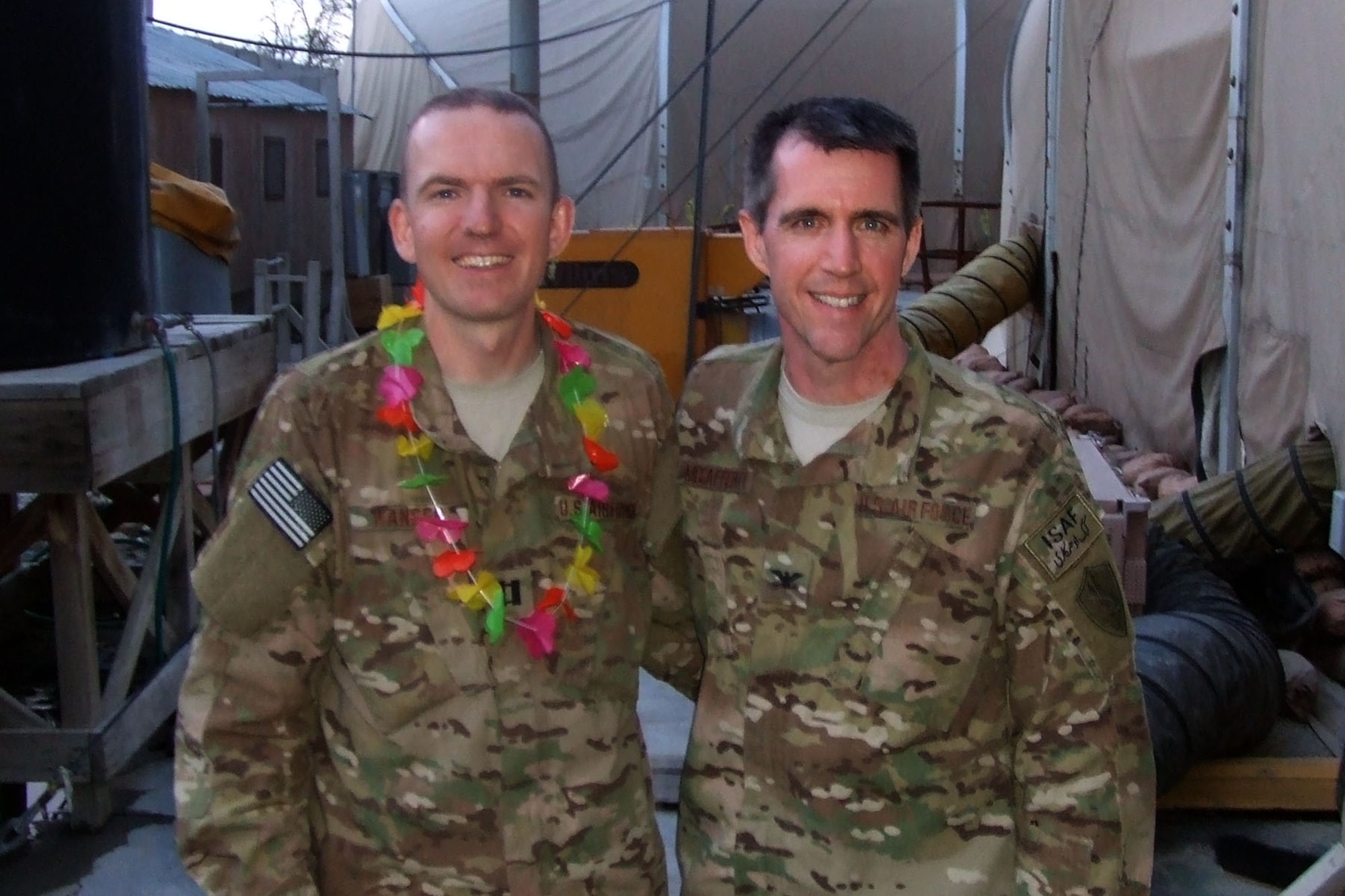 U.S. Air Force Col. Randall McCafferty and Capt. Joseph Hansen attend a luau at the Bagram Air Base Block party April 12, 2014.  The Air Forces Central Command Band entertained over 500 joint service members on the final day of their trip to Afghanistan. (U.S. Air Force Photo)