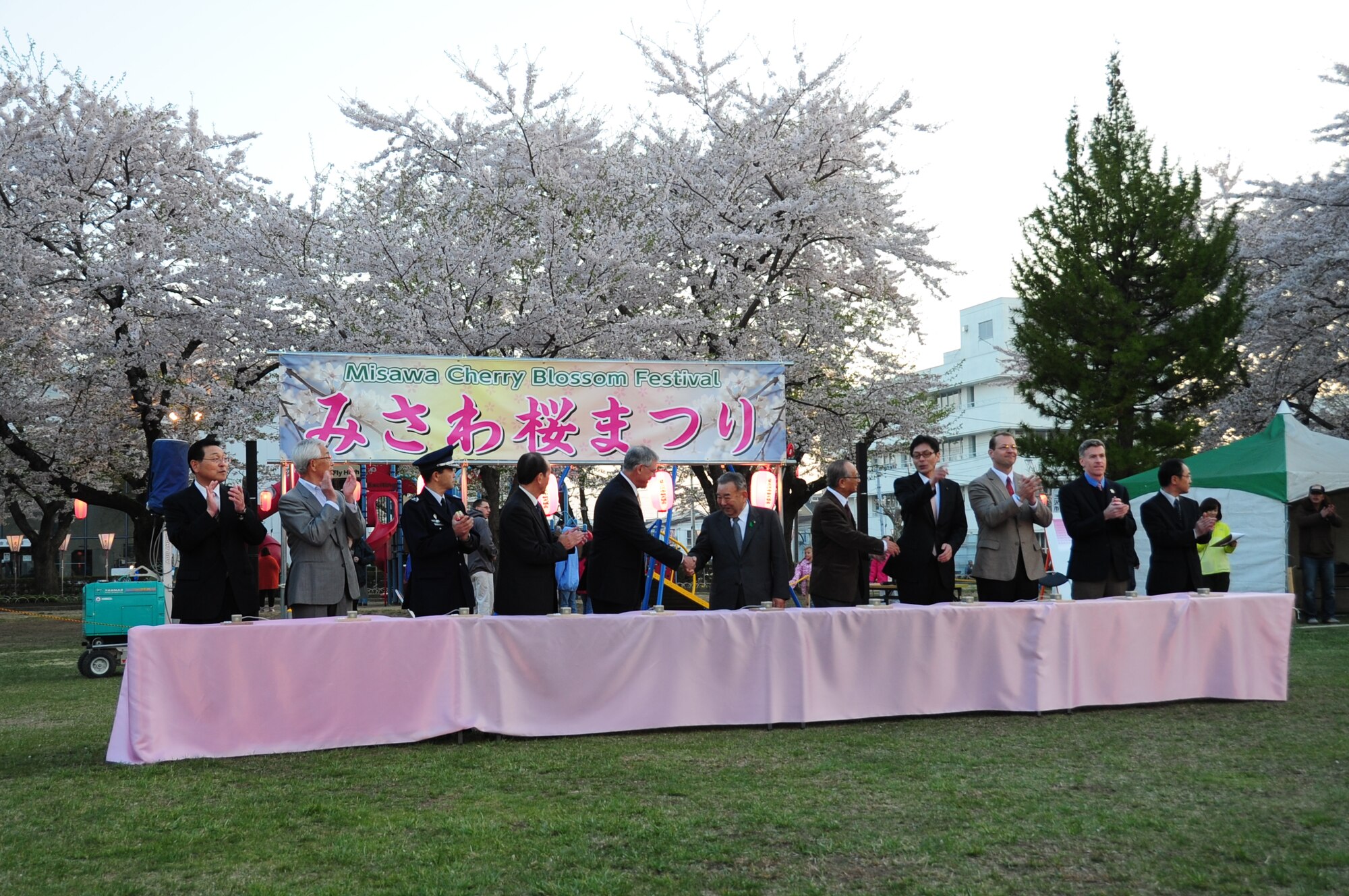 U.S. Air Force leadership and Japanese officials gather together to light hundreds of lanterns at the Misawa Cherry Blossom Festival in Misawa City, Japan, April 29, 2014.  U.S. and Japanese leaders demonstrate continued support and willingness to maintain a strong bilateral relationship. (U.S. Air Force/Tech. Sgt. April Quintanilla)