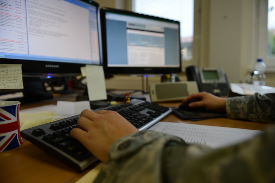 U.S. Air Force Airman 1st Class Tessa Boyea, 52nd Contracting Squadron contracting officer from Saratoga Springs, N.Y., ensures payments are up-to-date on a contract on Spangdahlem Air Base, Germany, April 24, 2014. Administrative paperwork takes up a large portion of Airmen’s time because of the complexity of some contracts. (U.S. Air Force photo by Senior Airman Gustavo Castillo/Released)