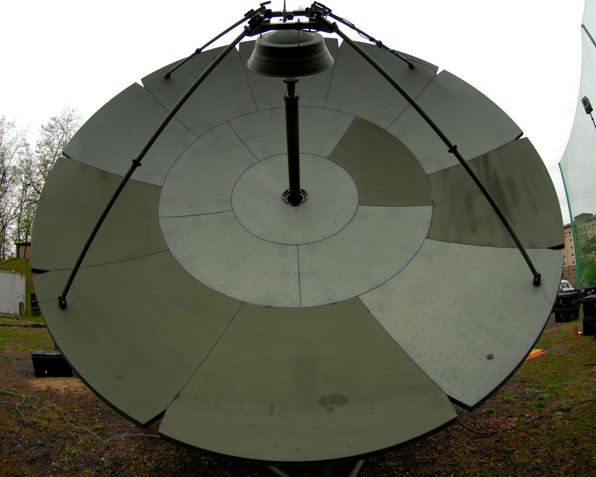 A newly repaired Quad-band Large Aperture Antenna stands ready for satellite accessioning testing on Osan Air Base, Republic of Korea, April 28, 2014. Five petals of the antenna were refurbished by members of the 51st Logistics Readiness Squadron Vehicle Management, who were able to use their skills and resources to save the Air Force tens of thousands of dollars in repair costs.  (U.S. Air Force photo / 1st Lt. Kay M. Nissen)