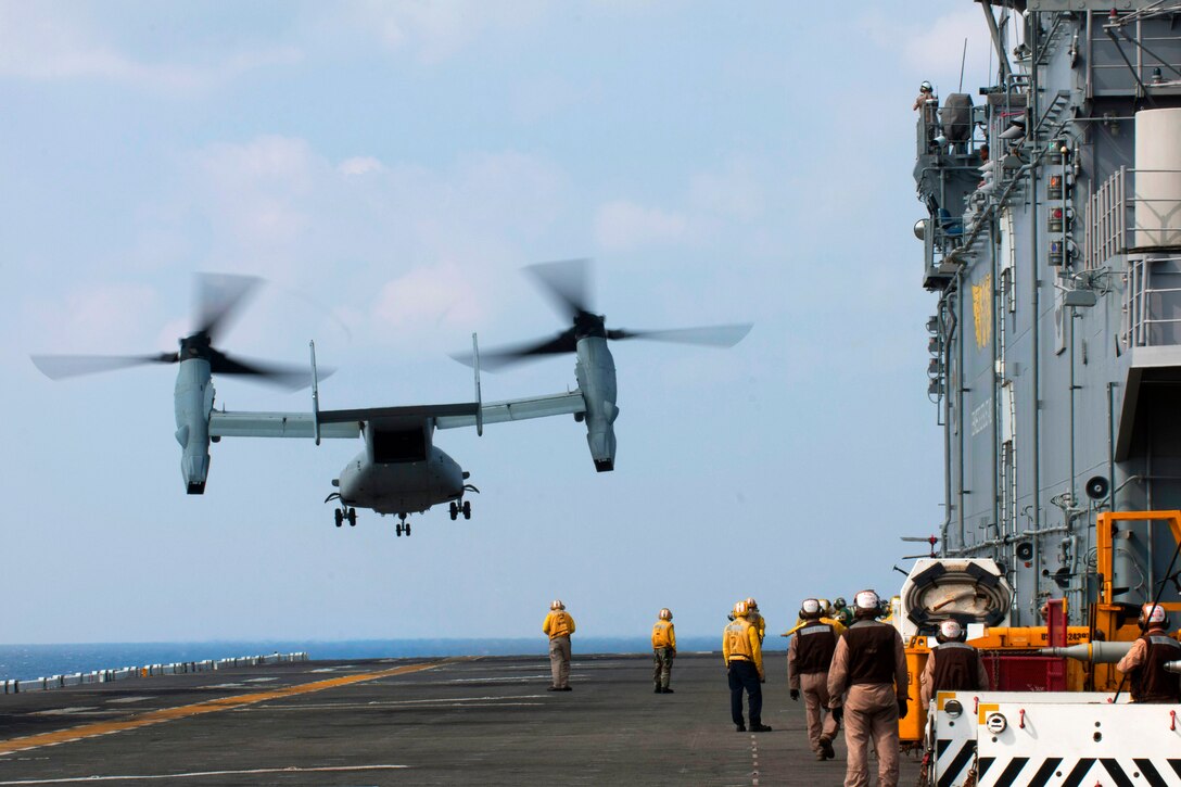 An MV-22 Osprey tiltrotor aircraft takes off from the flight deck of the USS Bonhomme Richard during aviation operations exercises in the East China Sea, April 23, 2014. 