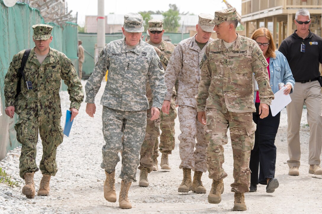 U.S. Army Gen. Martin E. Dempsey, chairman of the Joint Chiefs of Staff, talks with U.S. Army Maj. Gen. Stephen J. Townsend, commander of the Combined Joint Task Force 10 and 10th Mountain Division, during Dempsey's visit to Bagram Air Base, Afghanistan, May 2, 2014. 