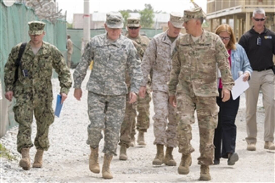 U.S. Army Gen. Martin E. Dempsey, chairman of the Joint Chiefs of Staff, talks with U.S. Army Maj. Gen. Stephen J. Townsend, commander of the Combined Joint Task Force 10 and 10th Mountain Division, during Dempsey's visit to Bagram Airfield, Afghanistan, May 2, 2014. Dempsey is in Afghanistan to visit troops and commanders. 