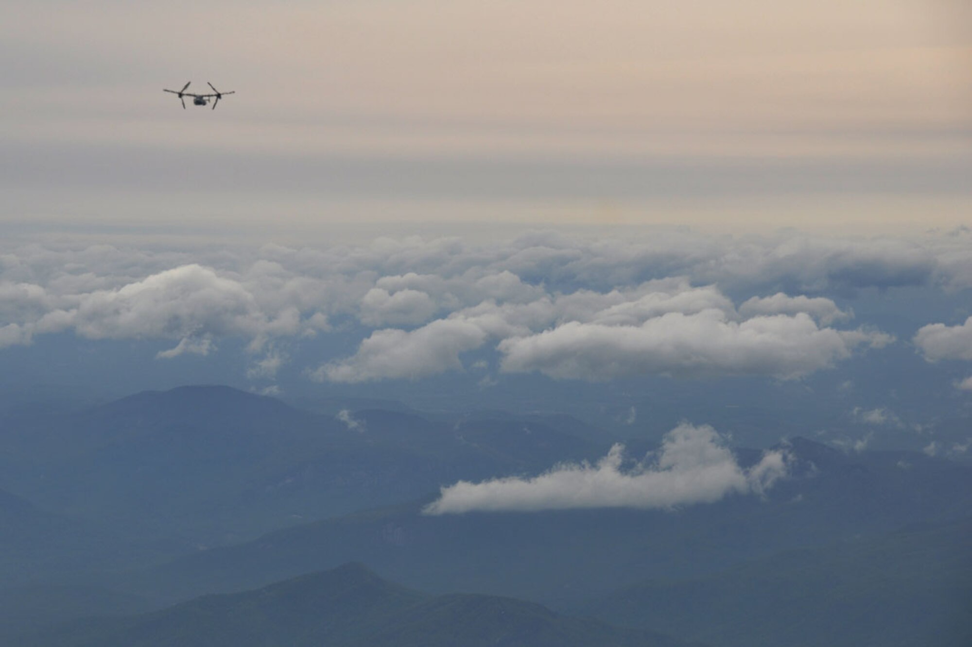 A MV-22B Osprey from the Marine Medium Tiltrotom Squadron, 264th Marine Corps Air Station, New River, North Carolina, flies over the North Georgia Mountains April 30. Taking off from Dobbins Air Reserve Base, Ga., this was one of four MV-22B Ospreys flown during an exercise, testing the unit’s ability to conduct a non-combatant air evacuation when stationed in a deployed area. (U.S. Air Force photo/Senior Airman Miles Wilson)