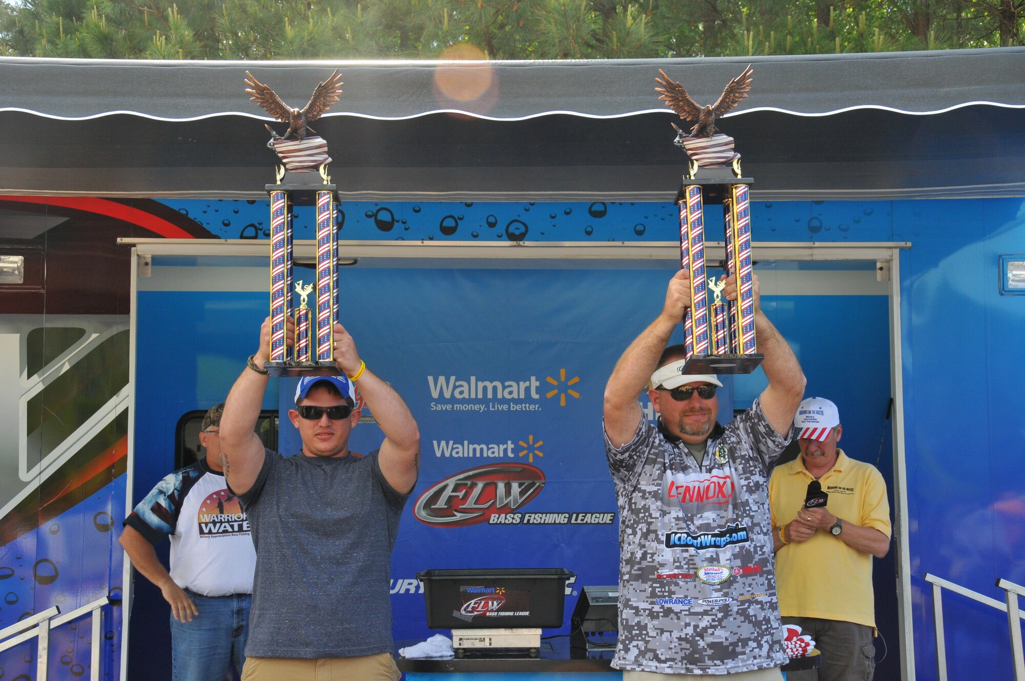 JORDON LAKE STATE PARK, N.C. – U.S. Army Spc. Cory Kidwell, Warrior Transition Battalion, Fort Bragg, N.C. (left) and Will Blanton, Fayetteville, N.C., took first place in the 9th Annual Warriors on the Water Military Appreciation Bass Fishing Tournament here, May 2.  Kidwell and Blanton’s catch for the day weighed in at 20 pounds, 13 ounces.  WOW is a non-profit organization that arranges the annual fishing tournament to show appreciation for the men and women serving in the Armed Forces.  (U.S. Air Force photo by Adam Luther)
